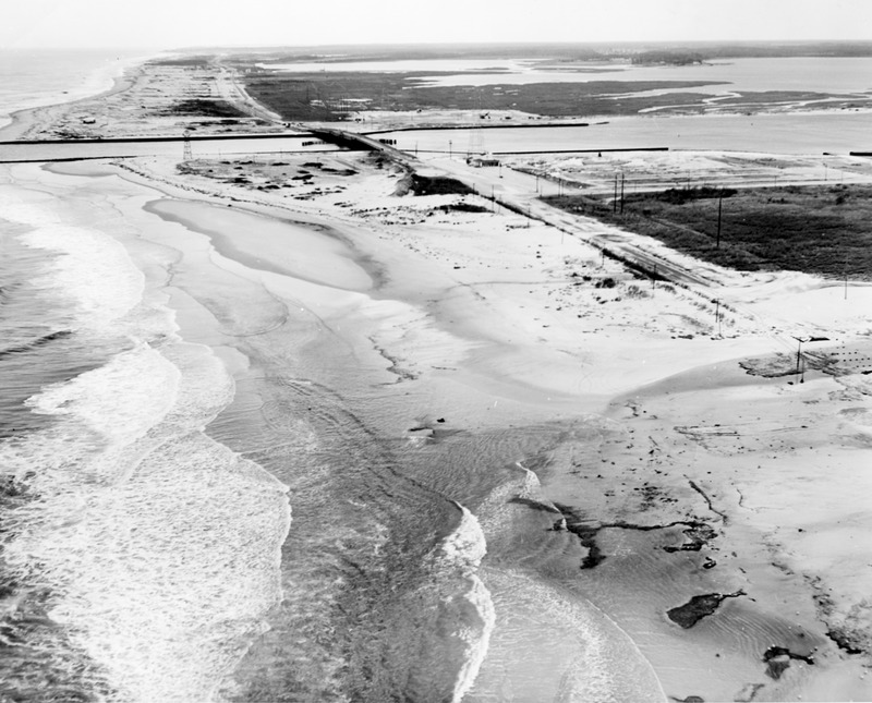 The dune is gone and sand covers Route 1, known as Route 14 in the 1960s, near Indian River Inlet. As much as 4 feet of sand had to be removed from the road and bulldozed back to the beach. SOURCE DELAWARE DEPARTMENT OF TRANSPORTATION